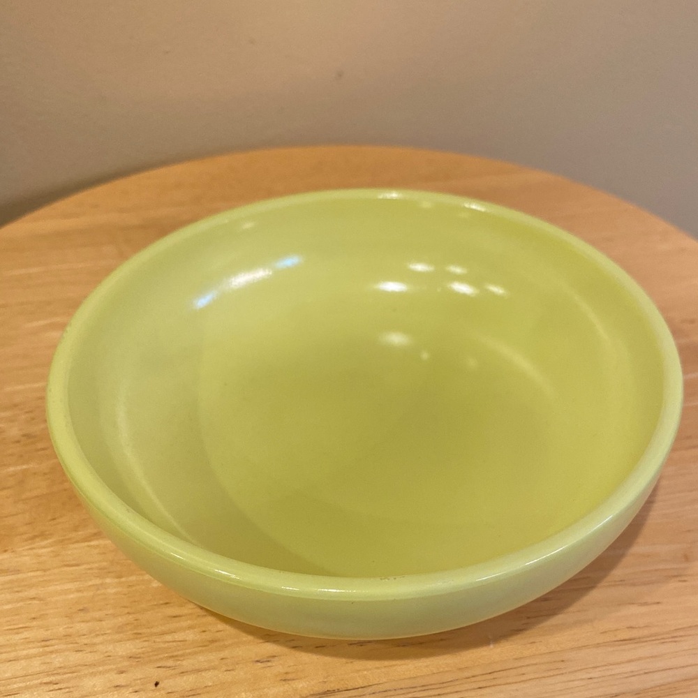 Yellow milk glass dish.
